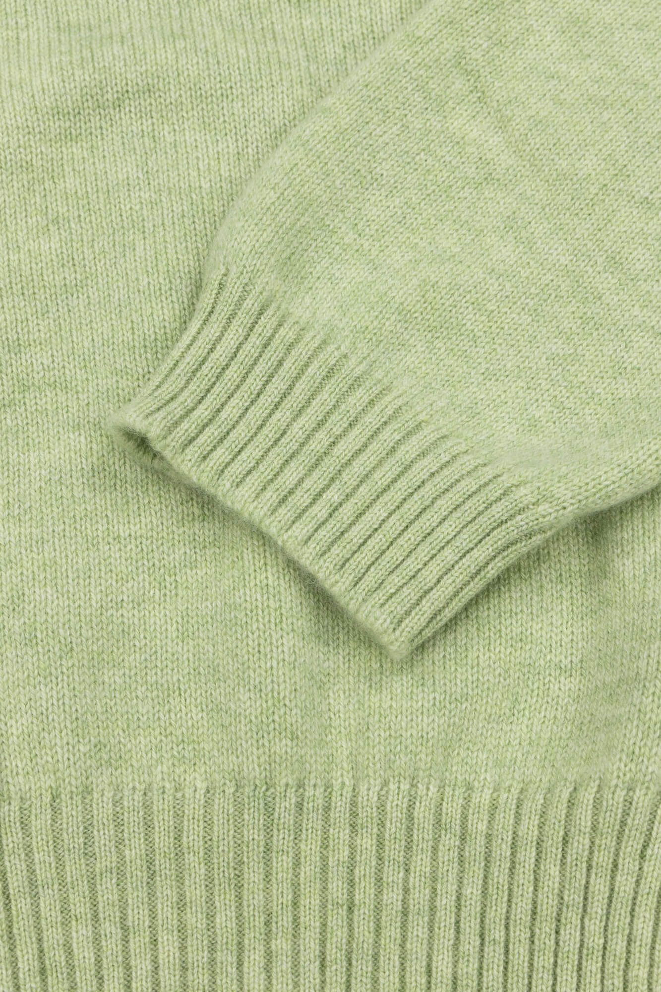 light green cashmere cardigan cuff detail