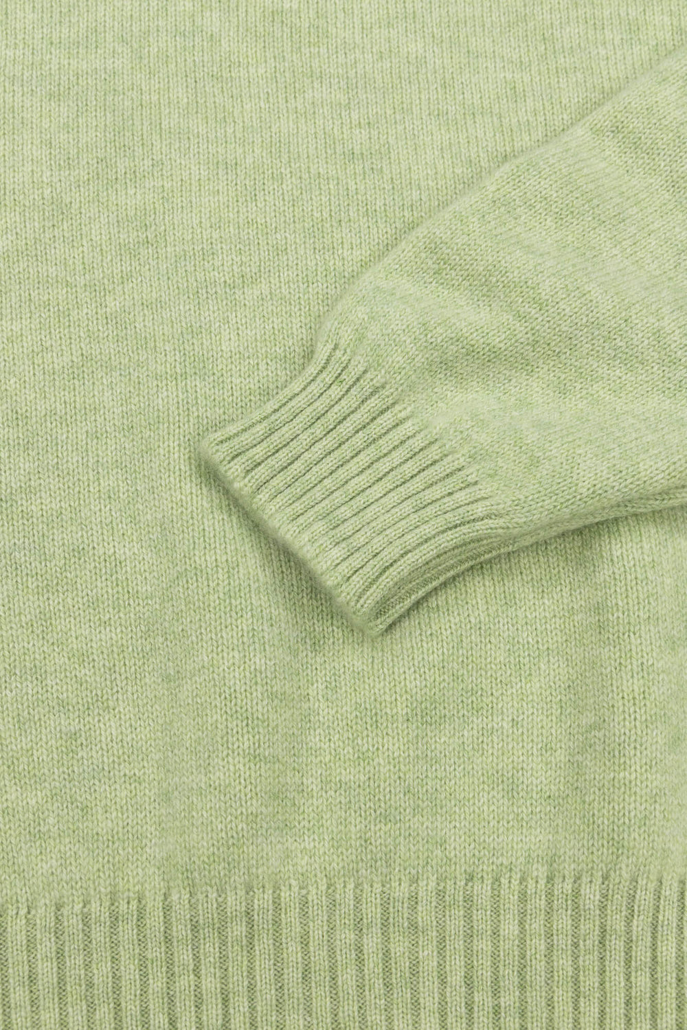 light green cashmere crewneck sweater cuff detail